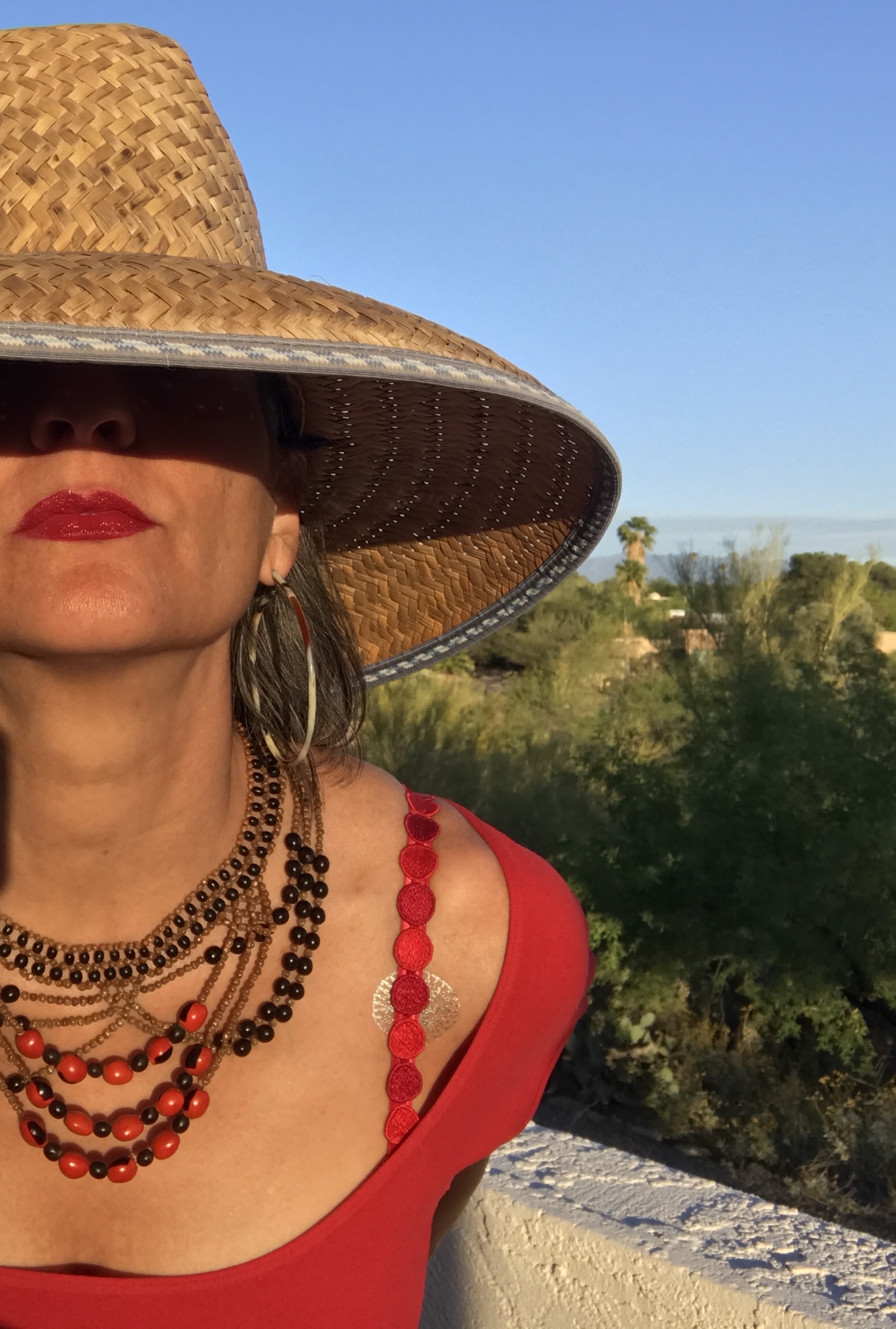 Women wearing mexican hat and red top